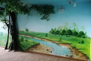 A mural of a landscape with a river, trees, and a large tree trunk. - Huashu Hotel(Shanghai Yexie Store) (Shanghai)