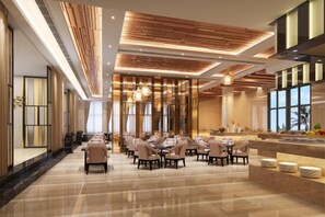 A spacious hotel lobby with a long reception desk, multiple seating areas, and a modern ceiling design. - Ever-Joy Muxin Xiangcun Hotel (Yixing)