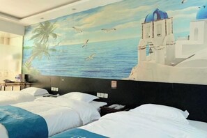 A hotel room with two beds, a mural of a coastal scene, and a view of the sea.