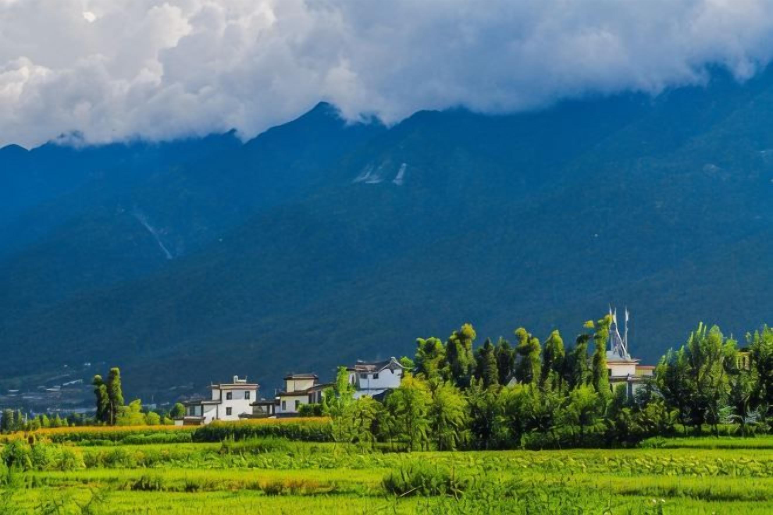Un paysage montagneux avec un village et des bâtiments au premier plan.