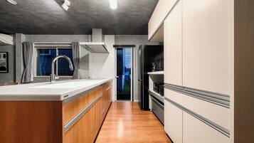 Comfort Villa | Private kitchen | Fridge, microwave, stovetop, dishwasher