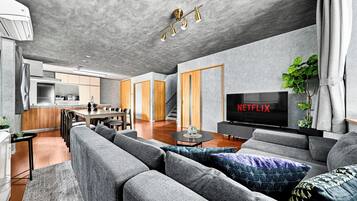 Villa Confort | Sala de estar | Televisión de pantalla plana
