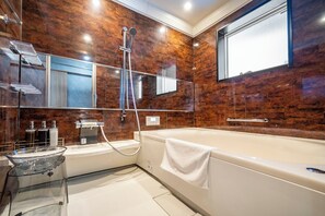 Hair dryer, slippers, bidet, towels
