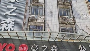 A building with a sign that reads "YO" and "Intelligent Home". - Haozhisen Apartment (Guangzhou)