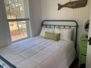 Iron/ironing board, travel crib, free WiFi, bed sheets