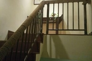 A staircase with a handrail and a metal gate. - Banduo Youlian Hostel (Shanghai)