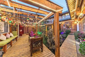 Unclassified image, 3 of 64, button - Xin Zhoujia Courtyard (Lijiang)
