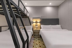 A hotel room with two beds, a staircase, a nightstand with a lamp, and a headboard. - 100 Inn Liangpin Hotel (Shanghai Waigaoqiao Gongcheng Road Subway Station) (Shanghai)