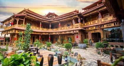 Sansheng Garden Inn (Puzhehei Xianrendong Shop)