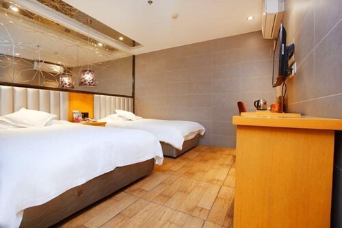 Qingmu Hotel (Nanjing Wutaishan Guangzhou Road Suiyuan Building)