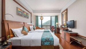 A hotel room with two beds, a TV, a balcony, and artwork on the walls. - Jade Jianguo Resort Zhejiang Pan'an (Pan'an)