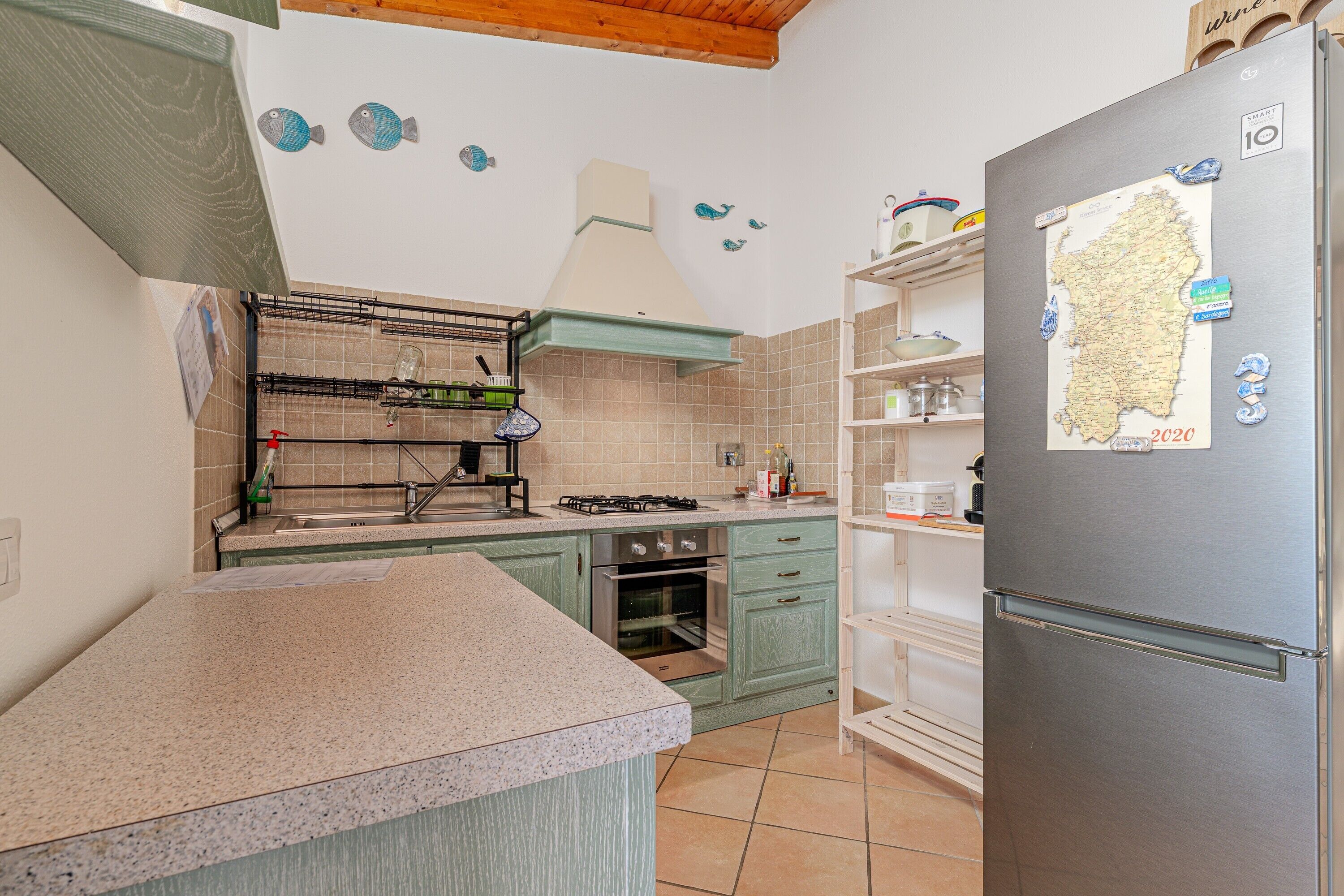 Fridge, coffee/tea maker, cookware/dishes/utensils