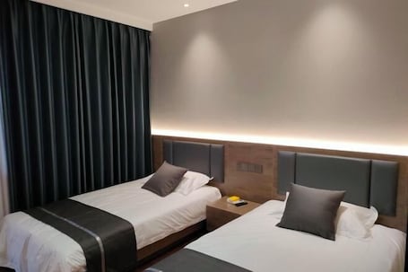 Room. XINYUN BUSINESS HOTEL