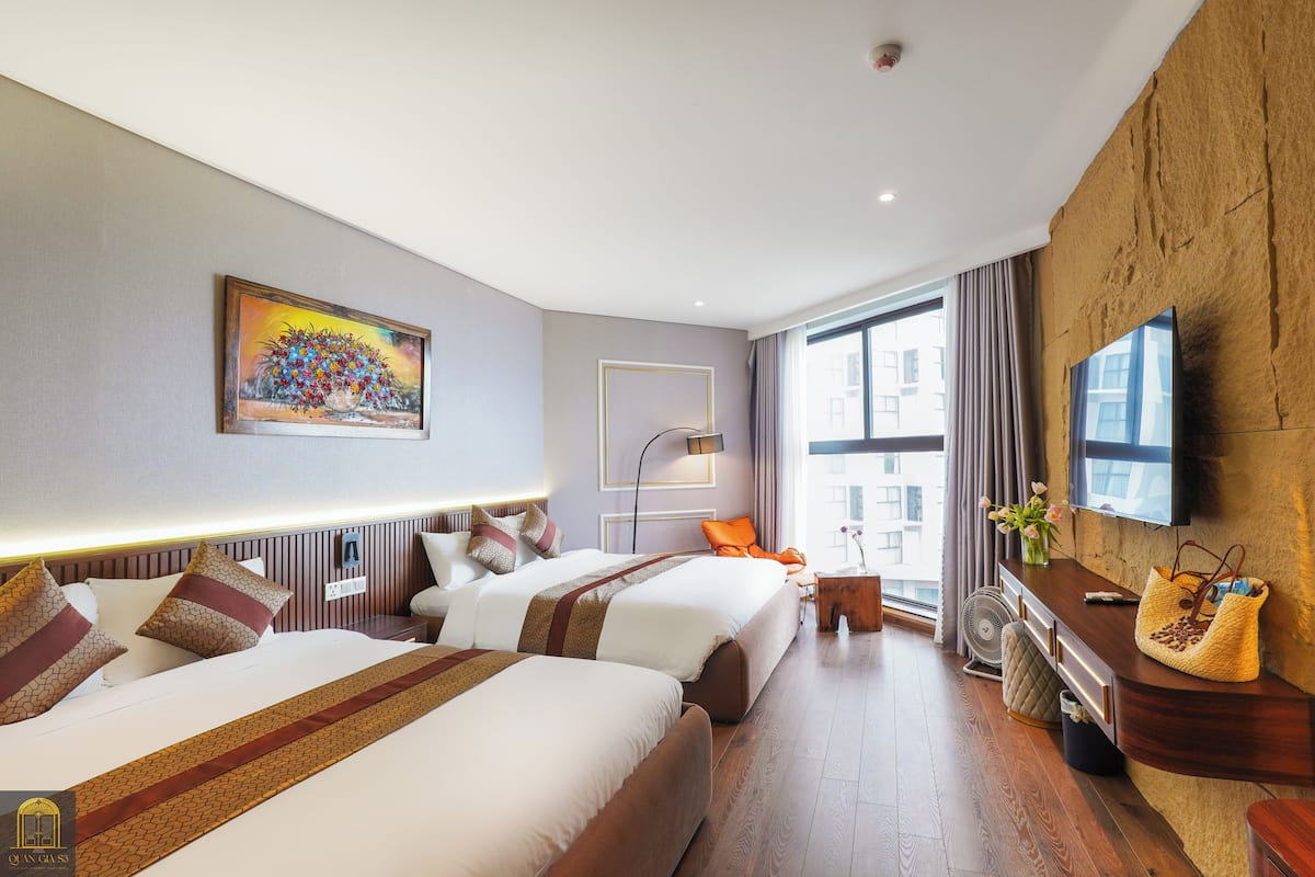Habitación cuádruple familiar, para no fumadores, vista al jardín | 2 habitaciones, artículos del minibar gratis y muebles diferentes