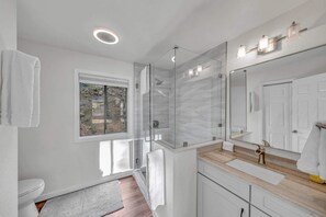 Shower, hair dryer, towels