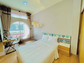 Habitación Deluxe doble de uso individual, vistas a la ciudad | Zona de estar