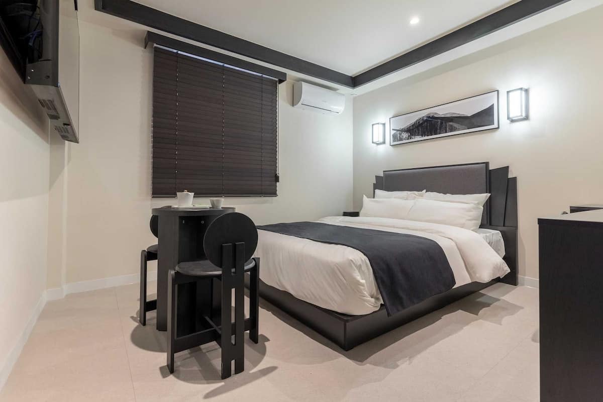 Individually decorated, desk, laptop workspace, blackout drapes