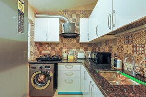 Apartment, 3 Bedrooms, Balcony, Pool View | Private kitchen - Alaya Stays Veera Serina 3 BHK with Pool (Candolim)