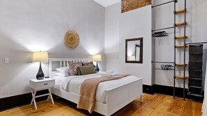 1 bedroom, desk, iron/ironing board, travel crib