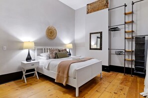 1 bedroom, desk, iron/ironing board, travel crib