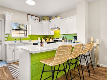 Lazy Lime's breakfast bar in the Kitchen seating for four