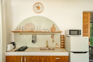 Fridge, microwave, stovetop, coffee/tea maker