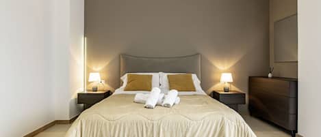 2 habitaciones, tabla de planchar con plancha, wifi y ropa de cama