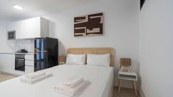 Iron/ironing board, travel crib, free WiFi, bed sheets