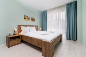 2 habitaciones, tabla de planchar con plancha, wifi y ropa de cama 