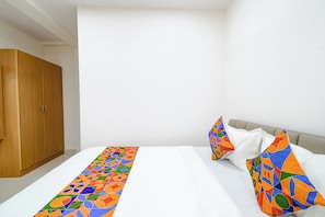 Egyptian cotton sheets, premium bedding, in-room safe, free WiFi - Fabhotel Elegance (Hyderabad)