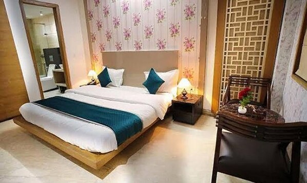 Deluxe kamer | Lakens van Egyptisch katoen, luxe beddengoed, pillowtop-bedden
