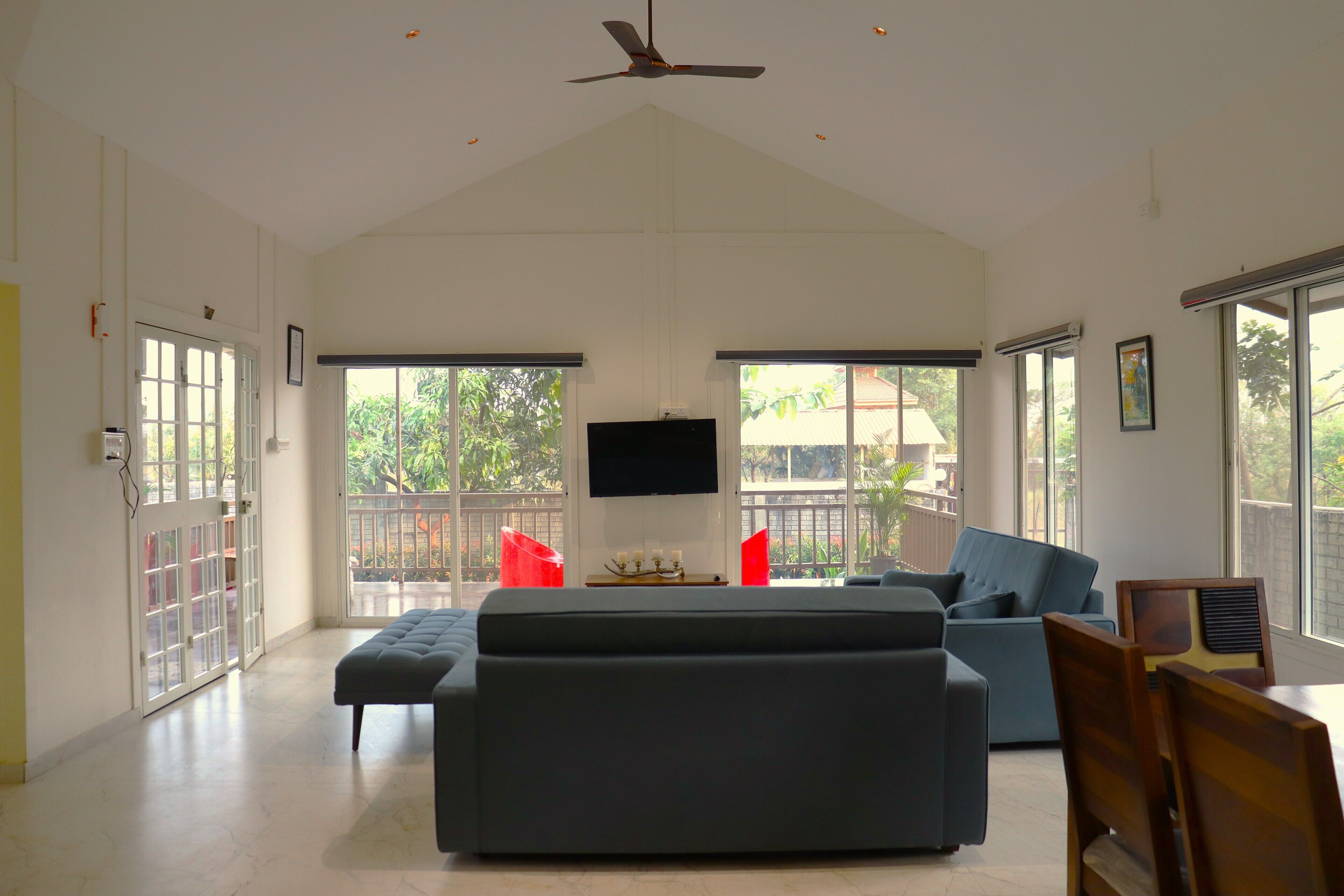 Villa With Private Pool (2BHK) | Living area | 32-inch LCD TV with cable channels