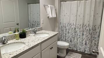 Hair dryer, towels, soap, toilet paper