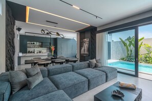 Luxury Villa, Patio, Pool View | Living area | Flat-screen TV