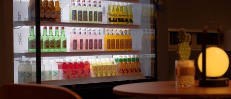 A refrigerated display case with various beverages.