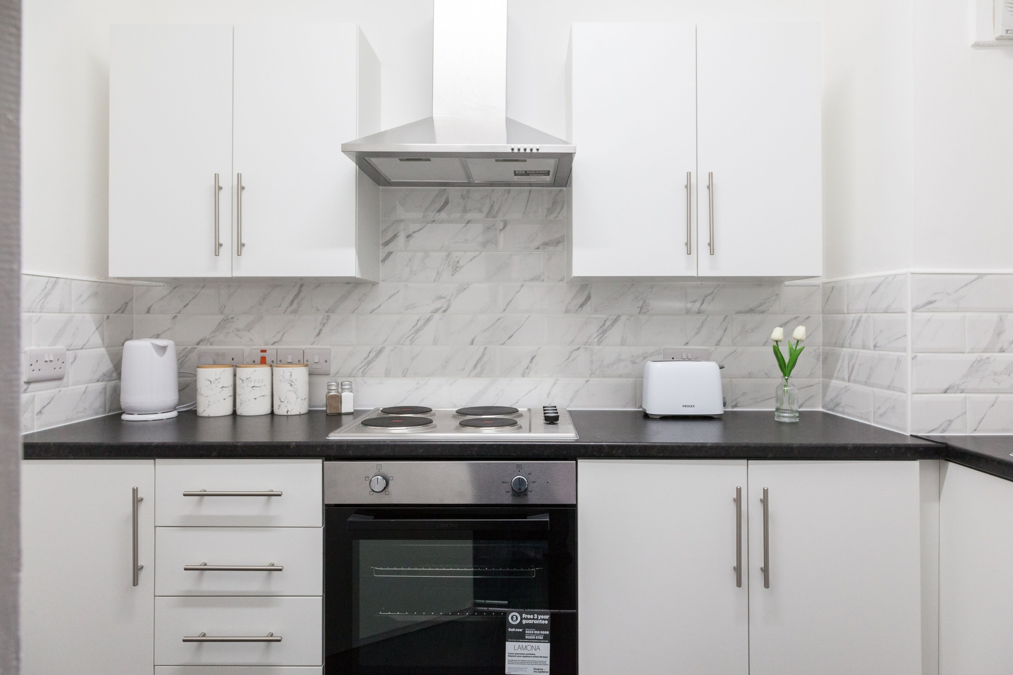 Fridge, stovetop, cookware/dishes/utensils, spices