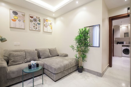 Living area. Elite One-Bedroom Apt AlRimal-4