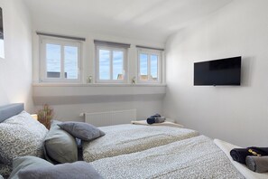 3 dormitorios, tabla de planchar con plancha, wifi gratis y ropa de cama