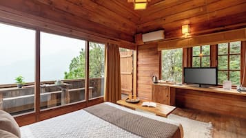 1 habitación y tabla de planchar con plancha