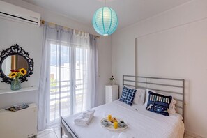 1 habitación, tabla de planchar con plancha, wifi gratis y ropa de cama