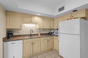 Coffee/tea maker, fridge, microwave, oven