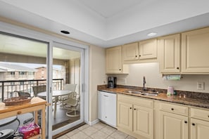Coffee/tea maker, fridge, microwave, oven