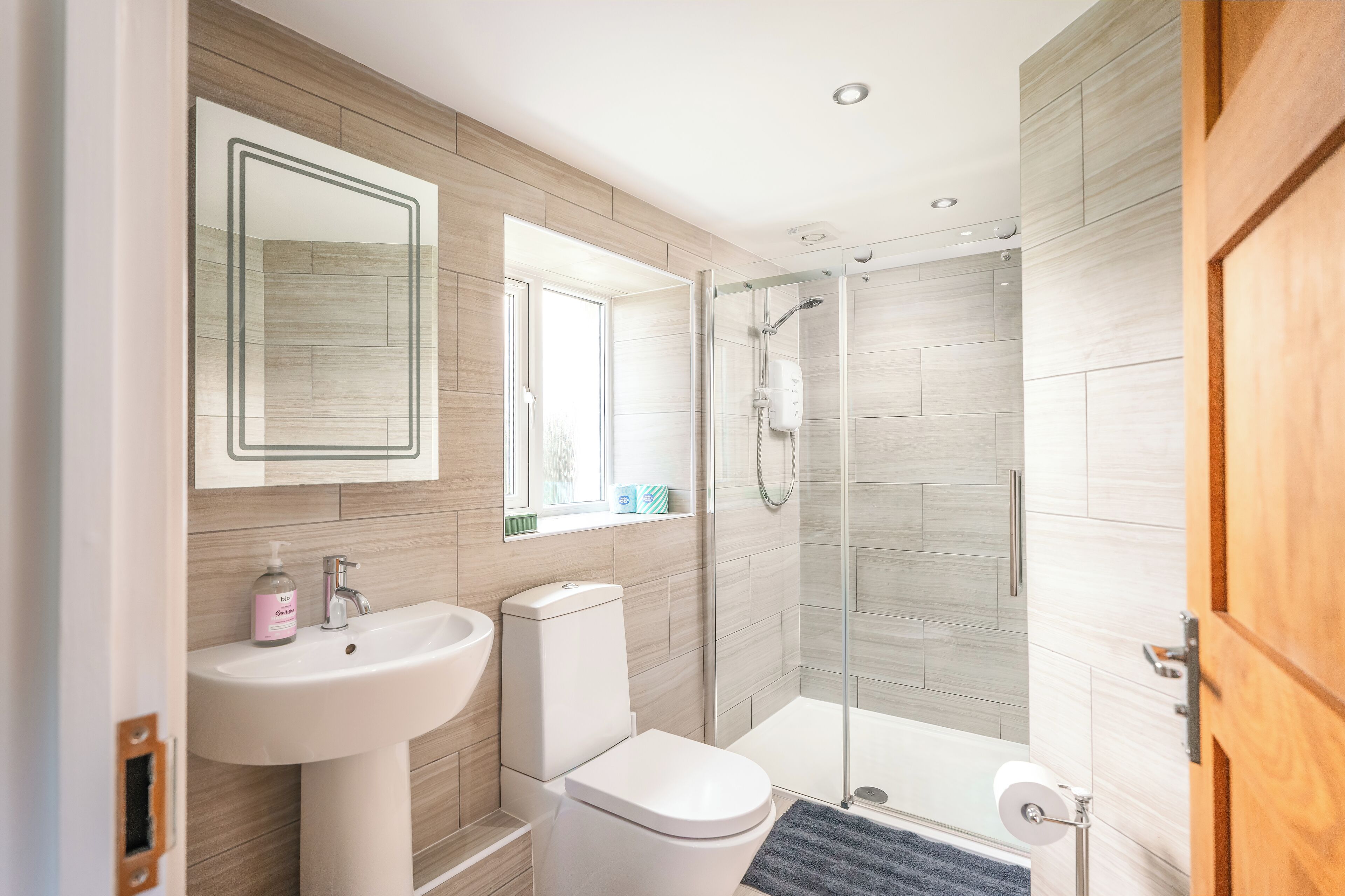 Shower, eco-friendly toiletries, towels, soap