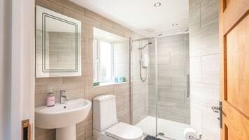 Shower, eco-friendly toiletries, towels, soap
