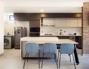 Fridge, microwave, stovetop, coffee/tea maker