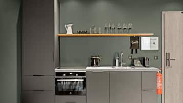 Fridge, stovetop, dishwasher, coffee/tea maker