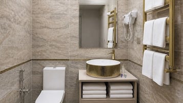 Jetted bath, rainfall showerhead, hair dryer, bathrobes