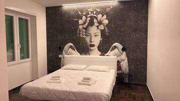 1 chambre, fer et planche Ă repasser, Wi-Fi, draps fournis