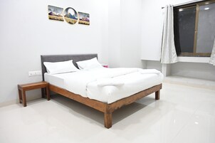 Quarto casal luxo, vista para a cidade