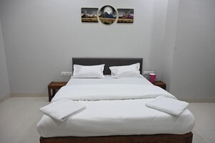 Quarto casal luxo, vista para a cidade